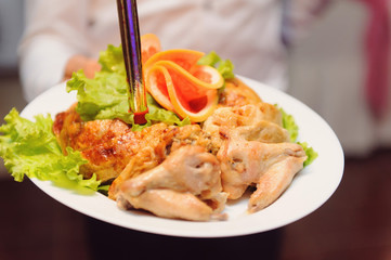 Chicken and Grapefruit on Plate