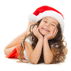 Happy little girl in Santa hat