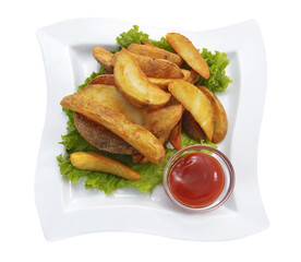Pile of french fries with lettuce and ketchup