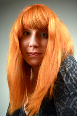 Naklejka premium Portrait of a red haired Woman