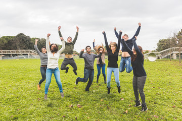 Multiethnic Group of Friends Jumping Together