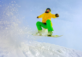Snowboarder jumping