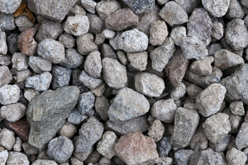 Natural stone texture background with mixed pebbles. rock, gray, dark, art, wallpaper, gravel, close-up, rough, surface, construction, material, mineral, pattern, macro, geology, uneven
