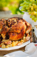 Whole Roast Chicken with Grapes, Garlic and Almonds