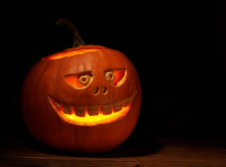 Scary jack o lantern pumpkin composition