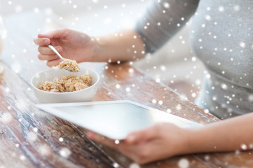 woman pointing finger to tablet pc computer