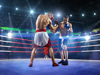 Fototapety  Dwóch zawodowych bokserów walczy na arenie
