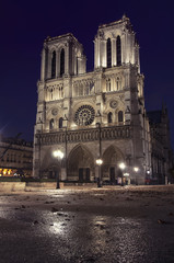 Fototapeta na wymiar Notre Dame de Paris, France at night after the rain