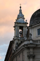 Fototapeta na wymiar Bell tower of Santa Maria dei Miracoli - Rome