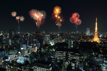 Fototapeta na wymiar Fireworks celebrating over Tokyo cityscape at night