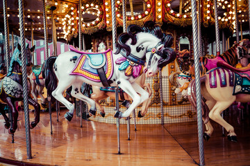 Fototapeta na wymiar Old French carousel in a holiday park.