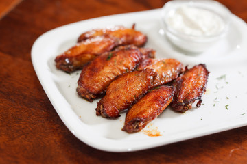 Chicken wings with sauce