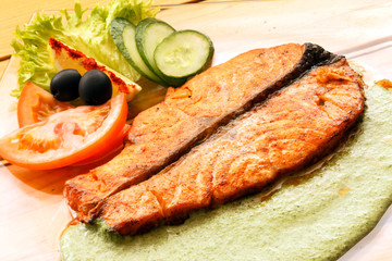 salmon steak with vegetables