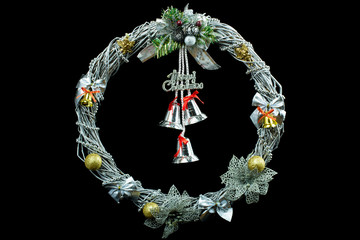 Christmas wreath decoration on a black background