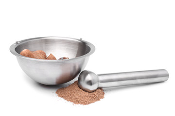 Mortar and pestle with nutmeg