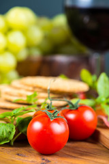 Fresh cherry tomatoes with basil