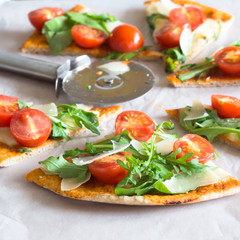 Arugula, Shaved Parmesan and Cherry Tomato Pizza