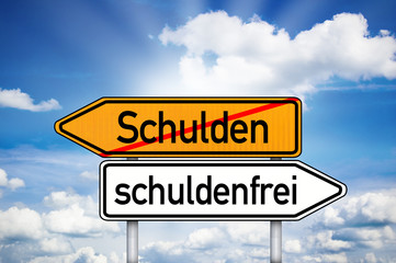 Wegweiser mit Schulden und schuldenfrei