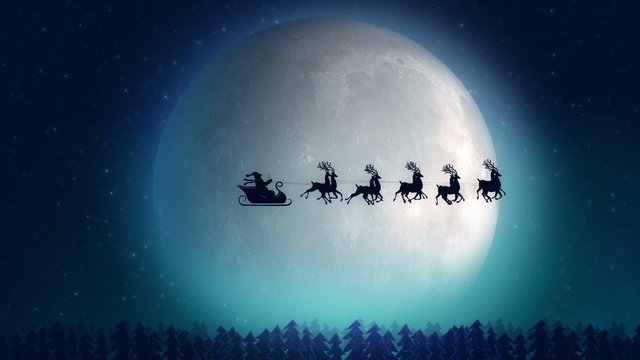 Santa with reindeer flying over the trees- Christmas concept
