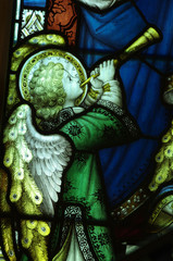 Angel making music on a trumpet