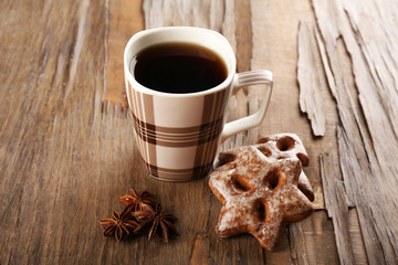 Cup of tea with cookies on table close-up