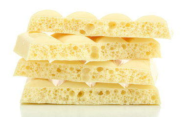 Tasty porous chocolate, isolated on white