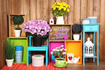 Beautiful colorful shelves with different home related objects