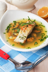 Sea food soup with cod fish steak