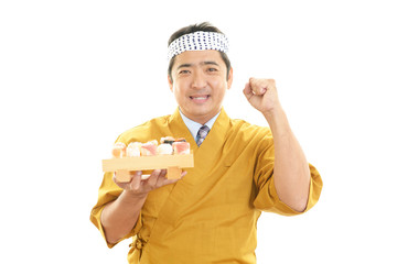 ガッツポーズの寿司職人
