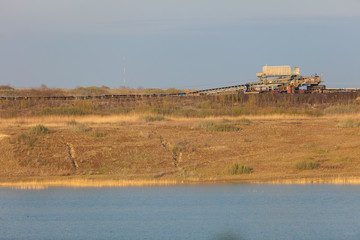 Opencast brown coal mine. Belt conveyor.