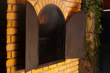 Traditional food. Smoked sausuages in smokehouse.