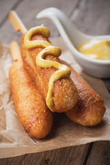 Corn dog with mustard