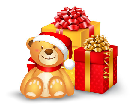 Christmas teddy bear sitting near the gift