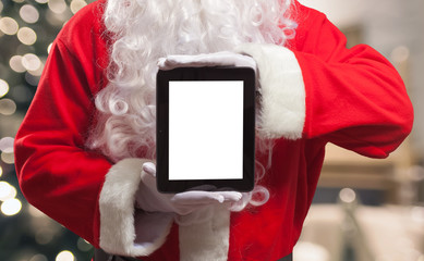 Santa Claus holding a digital tablet