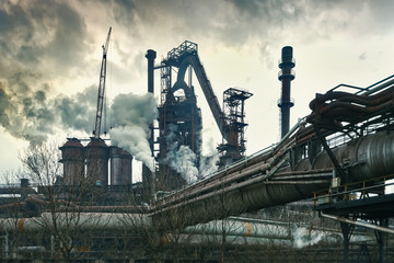 Fototapeta na wymiar Industrial plant with smoke stacks, industrial area