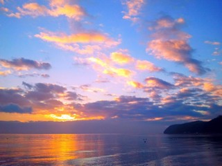 Colorful sun rise over the sea bay