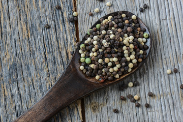 Peppercorn on a wooden Spoon