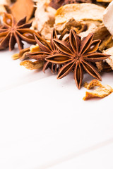 Different spices on the white board.