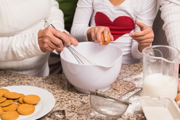 Multi-generation family baking together