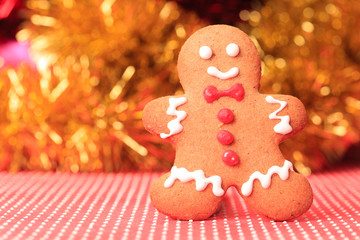 Gingerbread man against christmas background