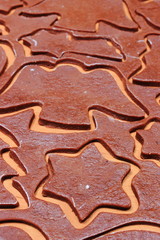 Dough for gingerbread in shape of  star and angel