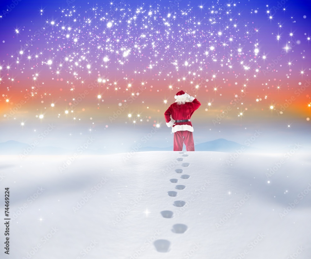 Poster composite image of santa walking in the snow