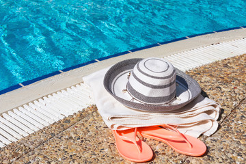Fototapeta na wymiar Beach accessories at the pool