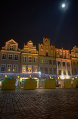 Naklejka premium Christmas decorations in the Old Market Square by night.