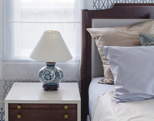chinese lamp style on table side in luxury bedroom at home