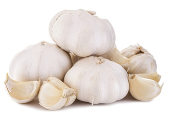 Obraz na płótnie Canvas Garlic. Three cloves of garlic arranged