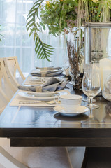 luxury dinning room with table set on table