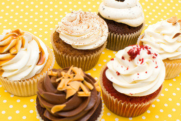 Cupcakes on yellow background