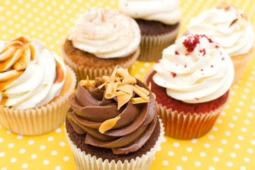 Cupcakes on yellow background