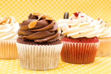 Cupcakes on yellow background